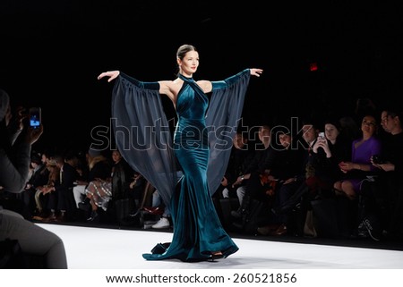 NEW YORK, NY - FEBRUARY 19: A model walks runway at the New York Life fashion show during MBFW Fall 2015 at Lincoln Center on February 19, 2015 in NYC.