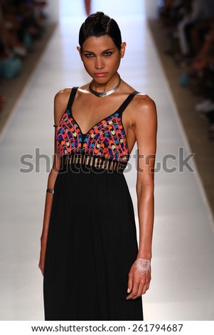 MIAMI, FL - JULY 20: A model walks the runway at the 6 Shore Road by Pooja during MBFW Swim 2015 at The Raleigh hotel on July 20, 2014 in Miami, FL.