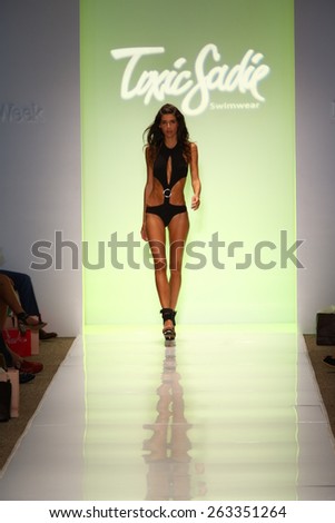 MIAMI, FL - JULY 21: A model walks runway at the Toxic Sadie fashion show during MBFW Swim 2015 at The Raleigh hotel on July 21, 2014 in Miami, FL.