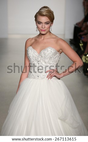 NEW YORK, NY - OCTOBER 12: A model walks runway at Matthew Christopher fashion show during Fall 2015 Bridal Collection at EZ Studios on October 12, 2014 in NYC.