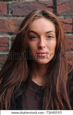 natural portrait of beautiful young brunette girl with no make-up