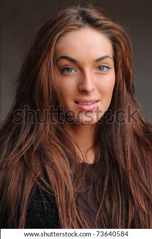natural portrait of beautiful young brunette girl with no makeup