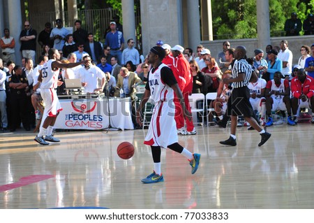 NEW YORK - MAY 10: basketball players from New York and LA amateur teams  competing at The People\'s Games public TV event in Union Square Park Tuesday, May 10, 2011, New York, NY