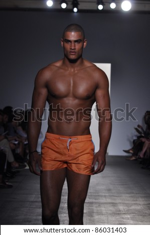 NEW YORK - SEPTEMBER 9: Male model walks the runway at the Parke & Ronen Spring / Summer 2012 collection presentation during Mercedes-Benz Fashion Week on September 9, 2011 in New York.