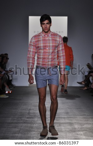 NEW YORK - SEPTEMBER 9: Male model walks the runway at the Parke & Ronen Spring / Summer 2012 collection presentation during Mercedes-Benz Fashion Week on September 9, 2011 in New York.
