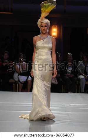 NEW YORK - SEPTEMBER 16: Model walks the runway at the Sushma Patel Fashion runway show at Waldorf Astoria during Couture Fashion Week on September 16, 2011 in New York.