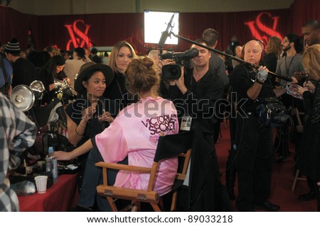 NEW YORK - NOVEMBER 10: Victoria\'s Secret video camera crew shoots backstage during the 2010 Victoria\'s Secret Fashion Show on November 10, 2010 at the Lexington Armory in New York.
