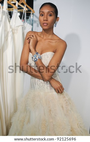 NEW YORK - OCTOBER 15: Model posing pretty at static presentation Valena Valentina Bridal Collection for Spring/ Summer 2012 during NY Bridal Fashion Week on October 15, 2011 in New York, USA