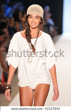MIAMI - JULY 14: Model walks runway at the L Space Swimsuit Collection for Spring/ Summer 2012 during Mercedes-Benz Swim Fashion Week on July 14, 2011 in Miami, FL