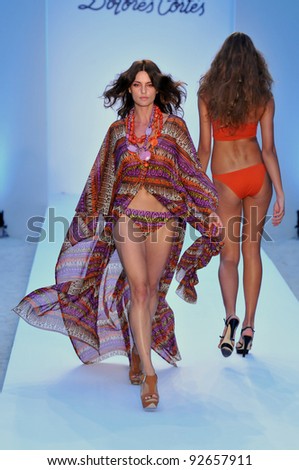 MIAMI - JULY 16: Model walking runway at the Dolores Cortes Swimsuit Collection for Spring/ Summer 2012 during Mercedes-Benz Swim Fashion Week on July 16, 2011 in Miami, FL