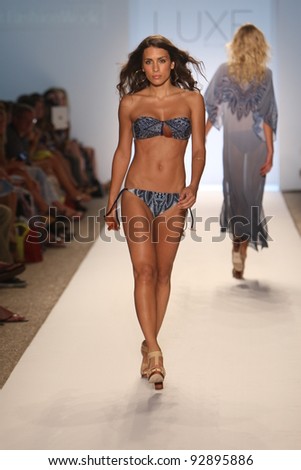 MIAMI - JULY 17: Model walking runway at the LUXE by Lisa Vogel Collection for Spring/ Summer 2012 during Mercedes-Benz Swim Fashion Week on July 17, 2011 in Miami, FL