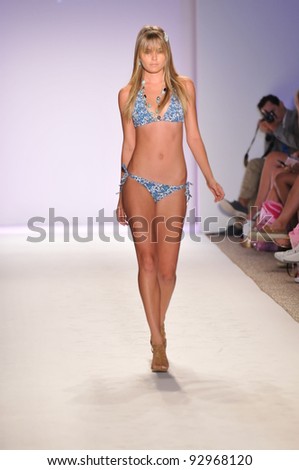 MIAMI - JULY 18: Model walking runway at the Aquarella Collection for Spring/ Summer 2012 during Mercedes-Benz Swim Fashion Week on July 18, 2011 in Miami, FL