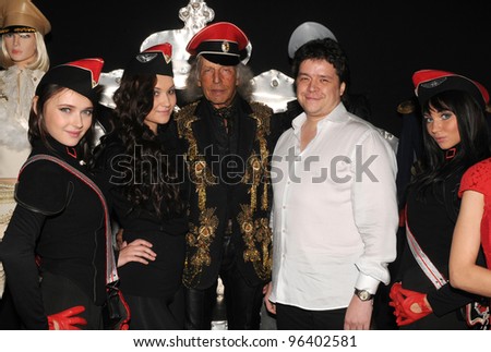 MOSCOW - OCTOBER 22: Hollywood party-goer James Goldstein (C) poses at the MHPI young designers presentation for Spring/ Summer 2012 during MBFW on October 22, 2011 in Moscow, Russia