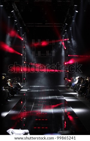 MOSCOW - APRIL 08: Creative lights on runway at the Dmitri Loginov Fall Winter 2012 runway presentation during Volvo Fashion Week on April 08, 2012 in Moscow, Russia