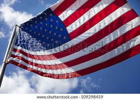 One United States of America flag shot from low angle on sunny day