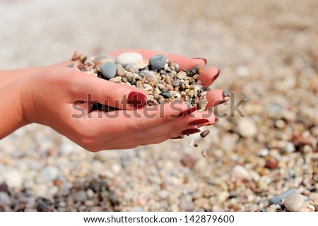 Handful of stones in hands
