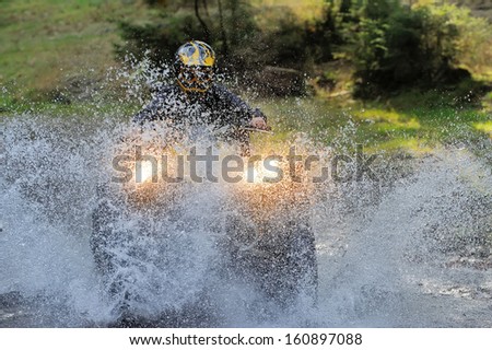 Travel on ATVs in river