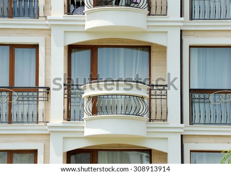 Pattern of hotel room balconies in modern building