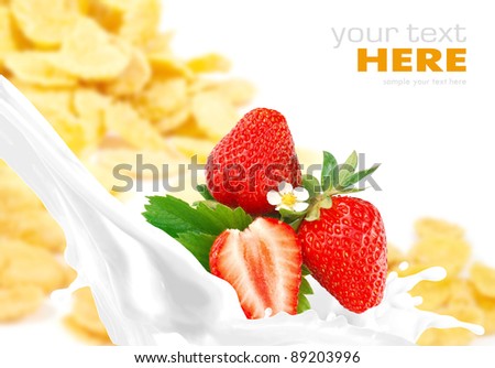 Milk splash with strawberry on corn flakes background