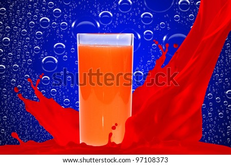 Red juice on blue background