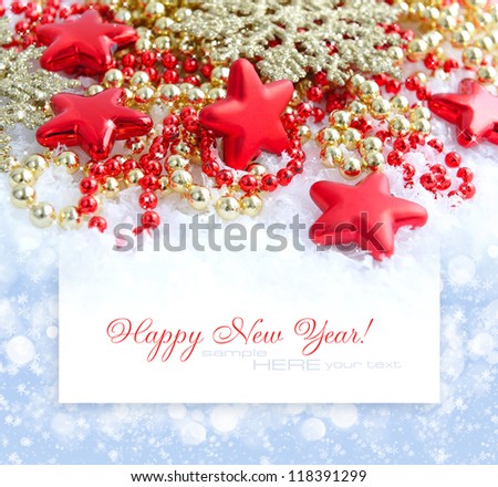Christmas decorations of bauble are with stars on a background a postal with sample text