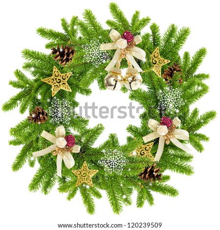 Christmas wreath with the branches of spruce and by decorations on a white background
