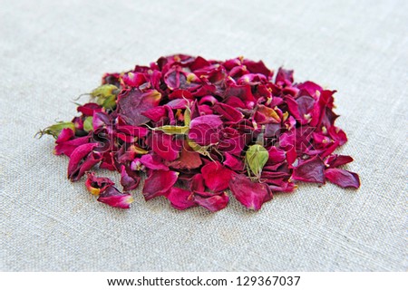 Dry healing flowers and petals on sackcloth, herbal medicine