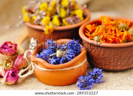 Healing herbs on sackcloth, dried flowers, herbal medicine