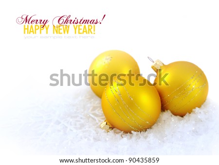 Christmas composition is with gold balls on snow