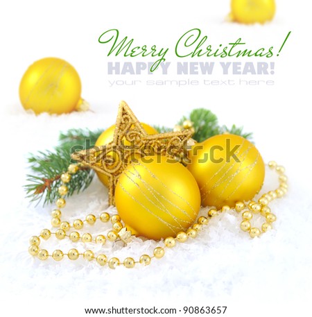Christmas composition is with gold balls and star on snow