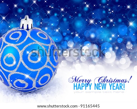 Christmas blue ball on a festive background