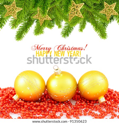 Gold balls and christmas decoration baubles and pine on white with space for text