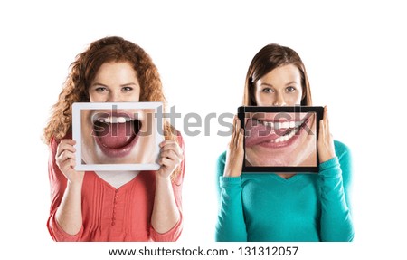 Funny studio portraits with tablet on isolated background