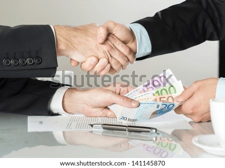 Businessmen are signing a contract, business contract details