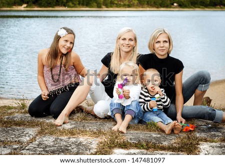 Family time by the lake in summer time