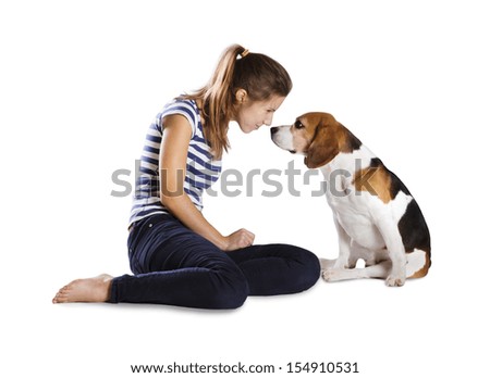 Dog with woman are posing in studio - isolated on white background