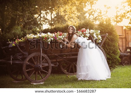 Beautiful bride in country style wedding dress