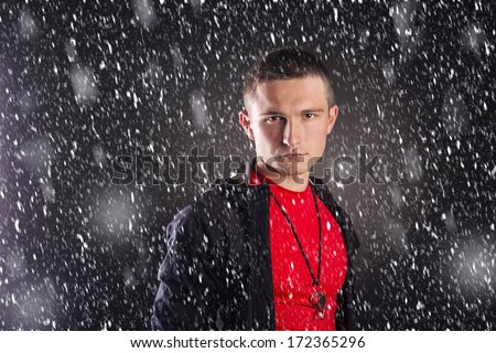 Professional fitness coach isolated on black background