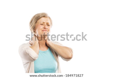 Senior woman suffering from neck pain isolated on white background Senior woman suffering from neck pain isolated on white background