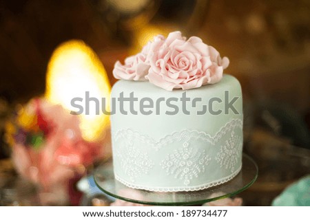 Beautiful and tasty wedding cake at wedding reception