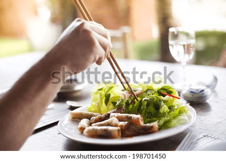 Asian vietnamese food - fresh spring rolls with basil salad and carrot
