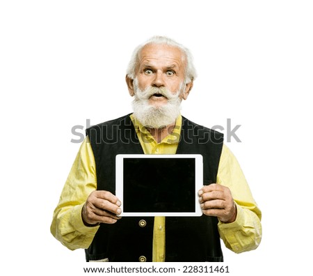 Old active bearded man with digital tablet isolated on white background