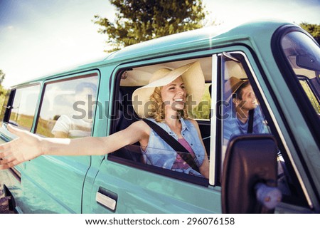 Teenage friends on a road trip on a summers day
