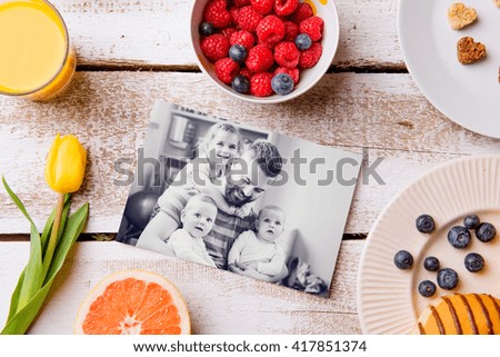 Fathers day composition. Black-and-white picture and breakfast