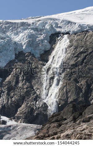 Waterfall and Buarbreen glacier (Folgefonna National Park, Norway)