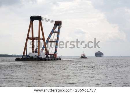 Danish floating crane. It is the largest in Northern Europe. It is about 85 meters high and it can lift 950 ton 65 meters above sea level.