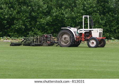 Tractor with lawn mower