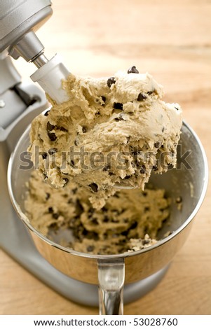 Chocolate chip cookie dough in mixer