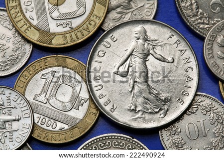 Coins of France. The sower designed by Oscar Roty depicted in the old five French franc coin.