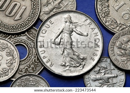 Coins of France. The sower designed by Oscar Roty depicted in the old five French franc coin.